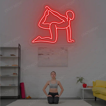 Eka Hasta Vyaghrasana Yoga Neon Sign glowing in red color in a yoga room