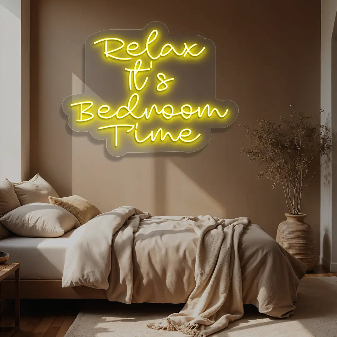 yellow relax its bedroom time neon sign mounted on a wall