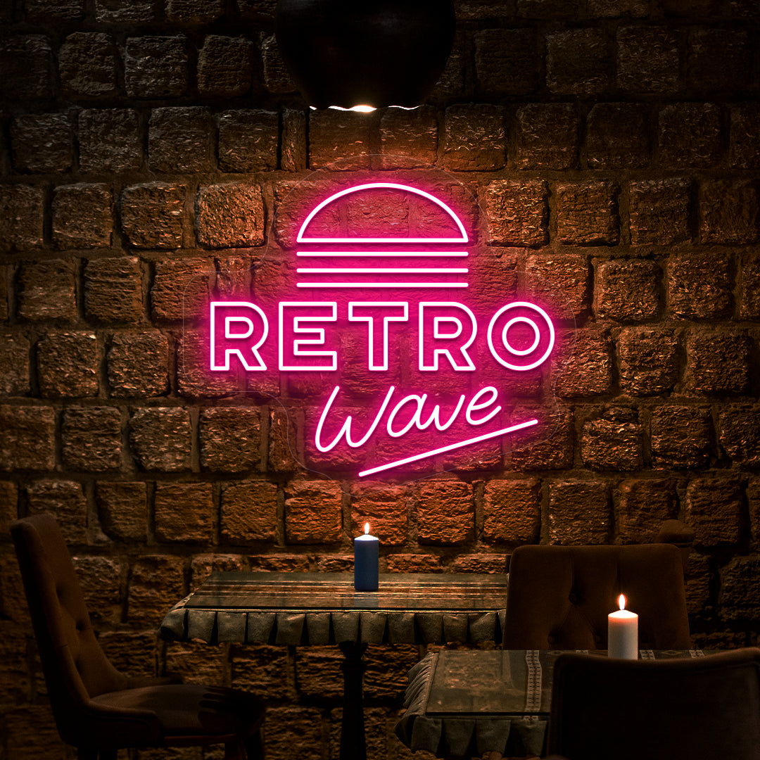 pink retro wave vintage neon sign mounted on a wall