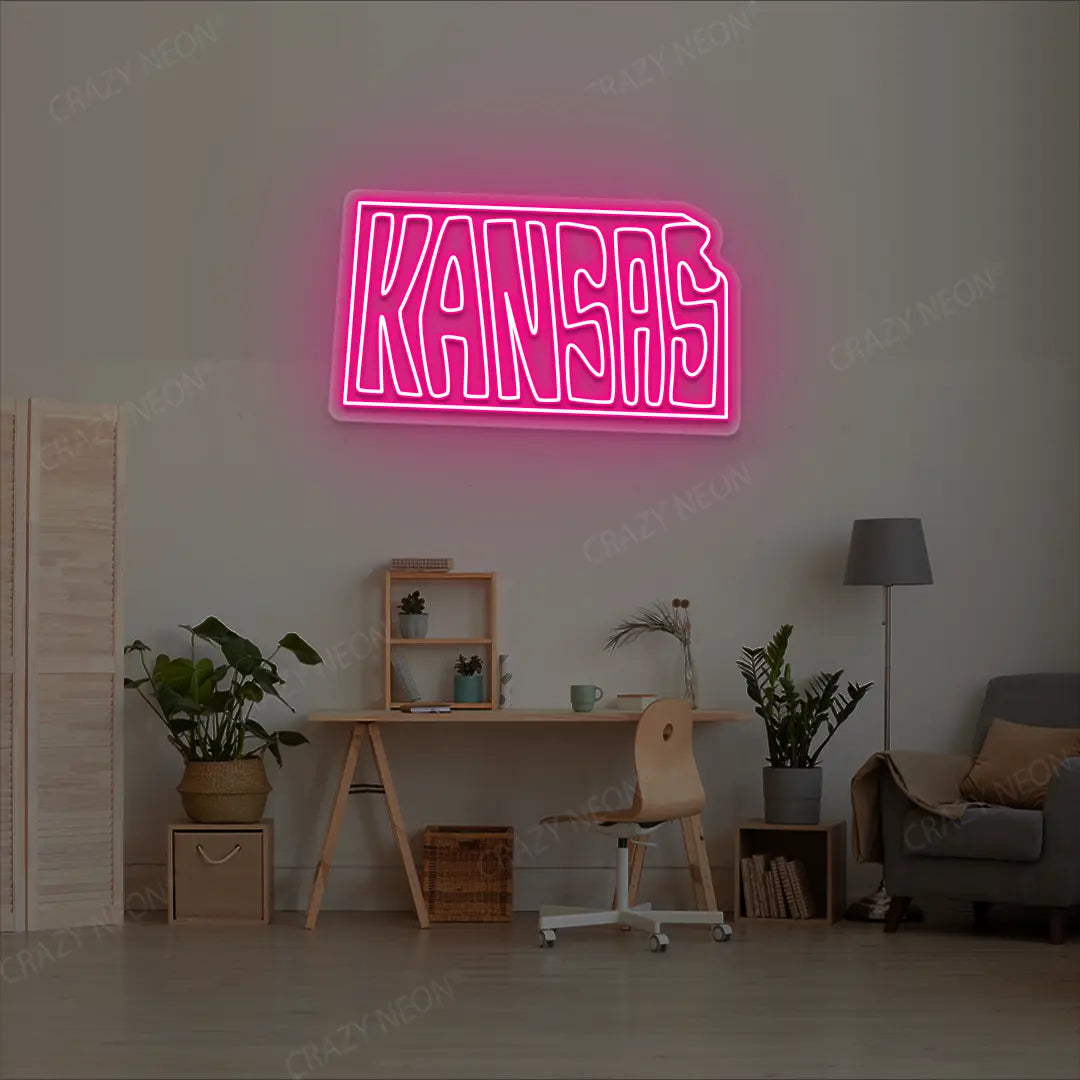 KANSAS Map Neon Sign lighting up in pink color in a room