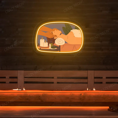Relaxation Massage Neon Artwork lighting up in orange color on a wooden spa wall