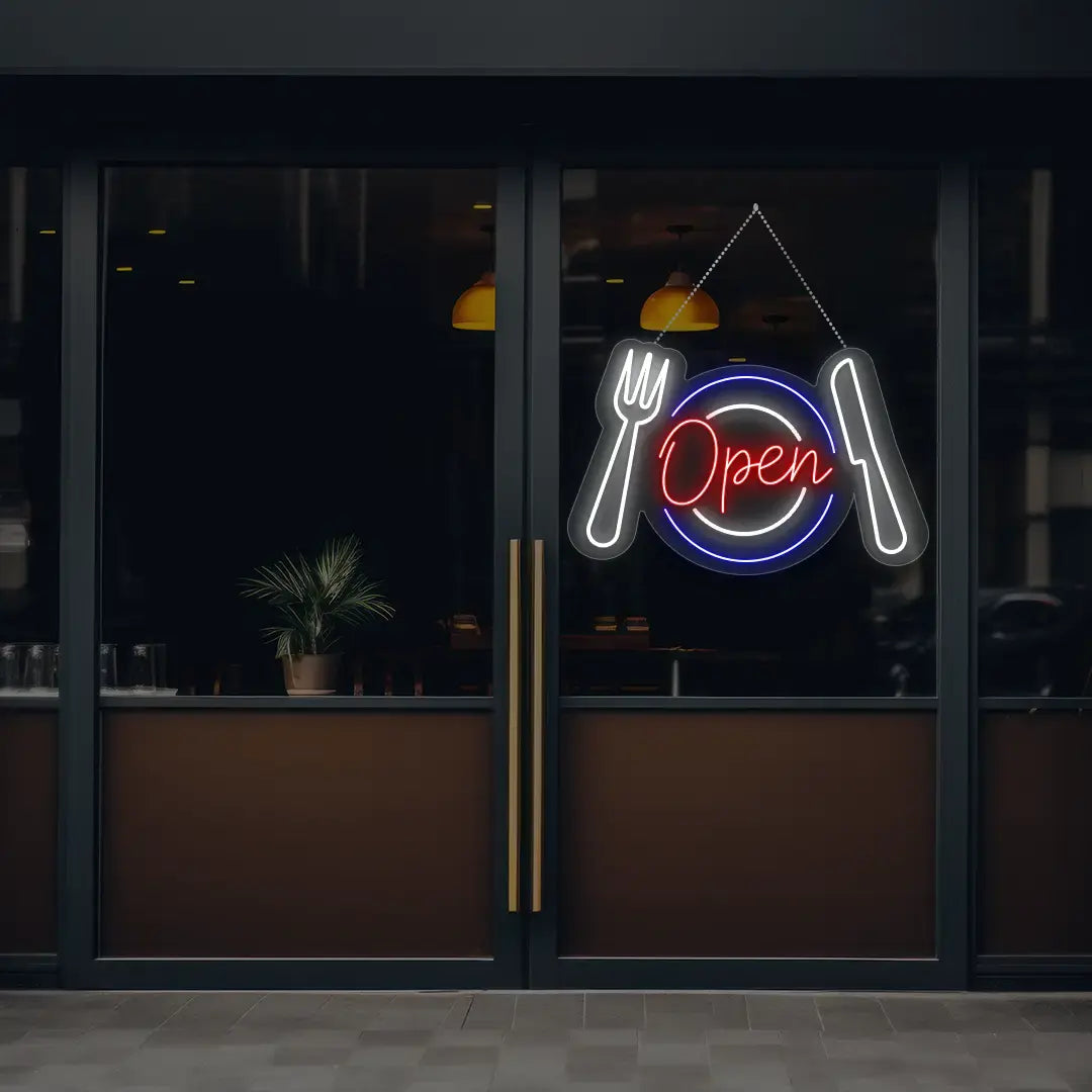 red diner open neon sign hanging on a window