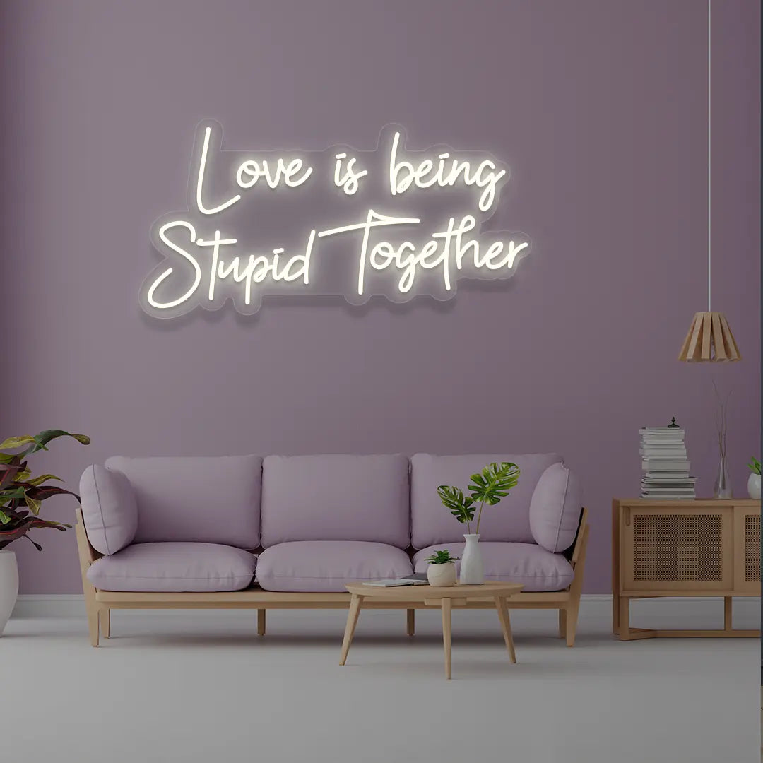 Love Is Being Stupid Together Neon Sign in White Color 