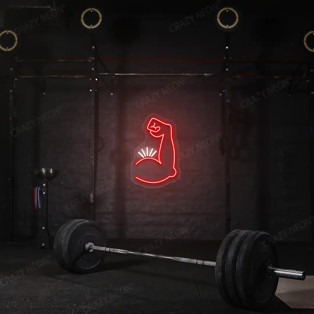 red and white bicep pump neon sign mounted on a wall
