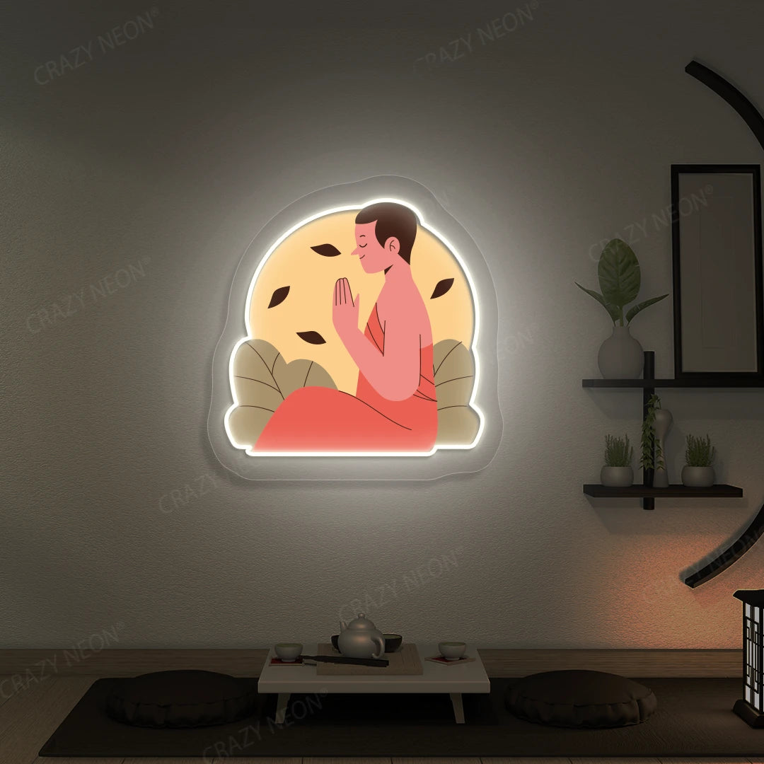 Serene Monk Neon Artwork lighting up in warm white color in a yoga room