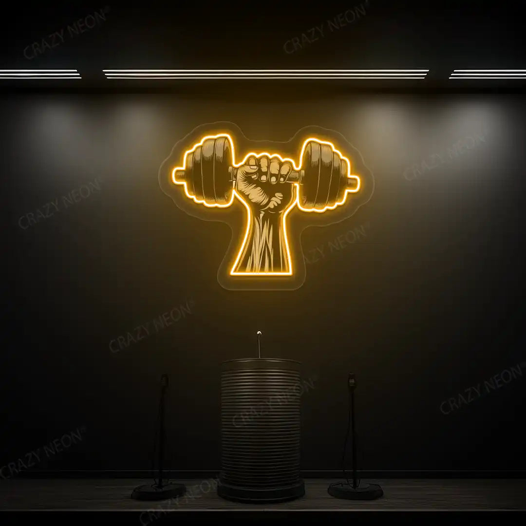 orange hand lifting dumbbell gym neon artwork mounted on a wall