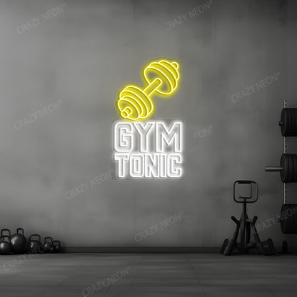 yellow and white gym tonic barbell neon sign mounted on a wall