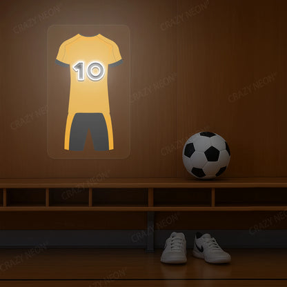 Yellow football jersey neon artwork with number 10 glowing on a wooden wall