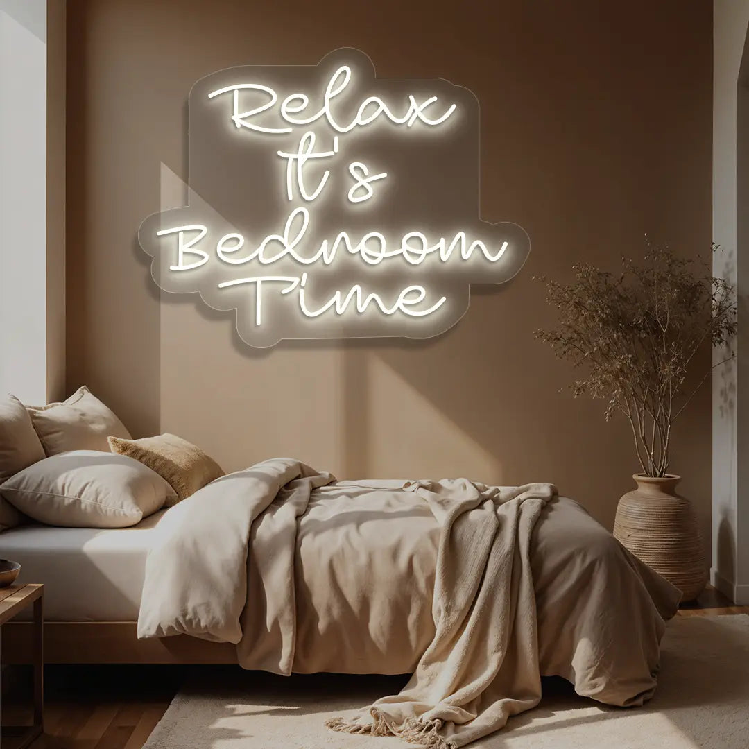 warm white relax its bedroom time neon sign mounted on a wall