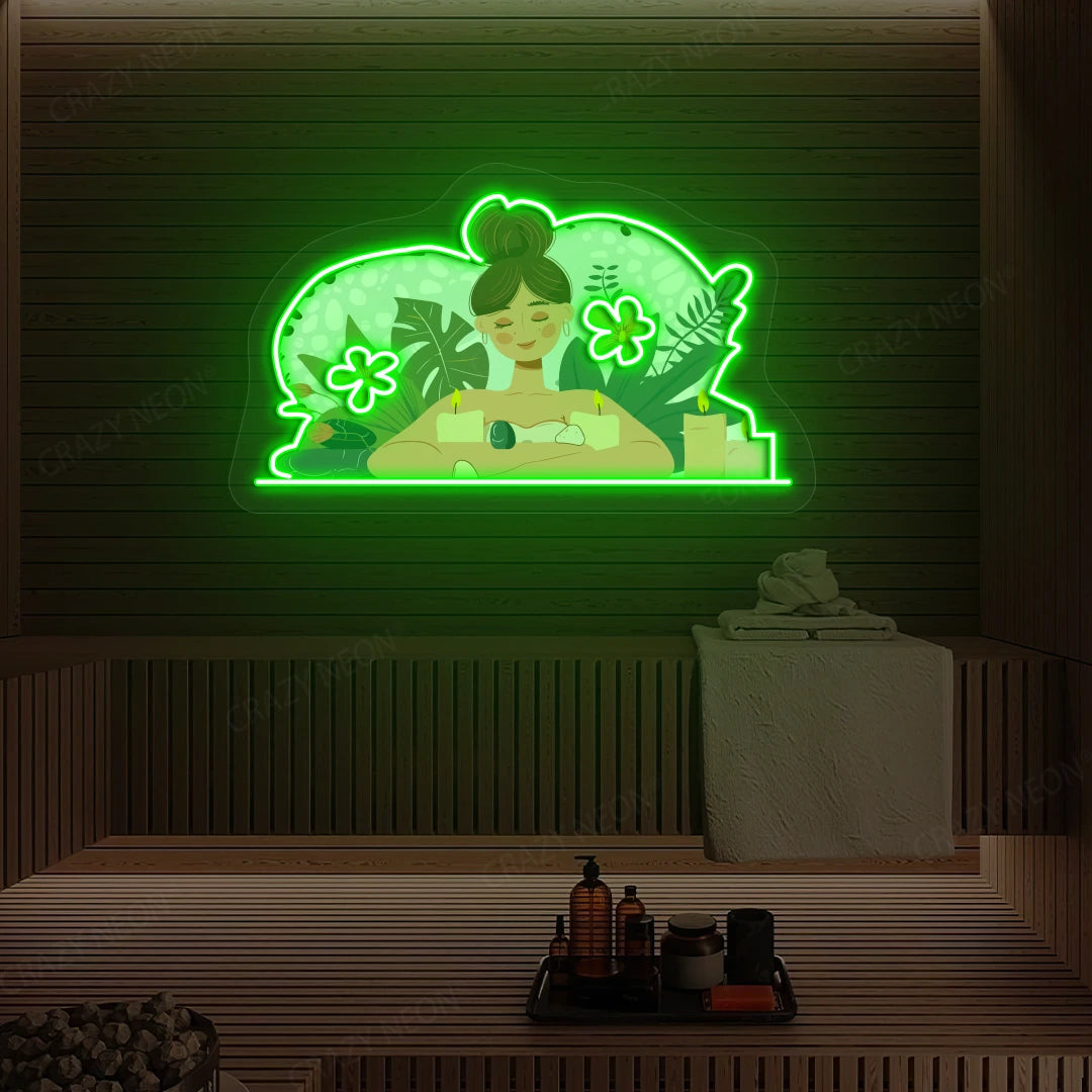Aromatherapy Relaxation Neon Artwork lighting up in green color on a wooden spa wall