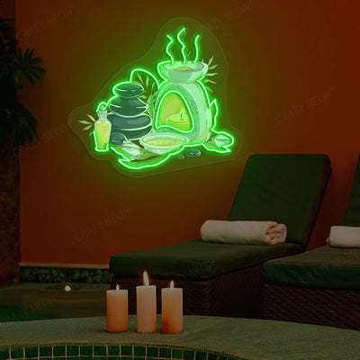 Spa Stones & Aromatherapy Neon Artwork lighting up in green color on a spa wall