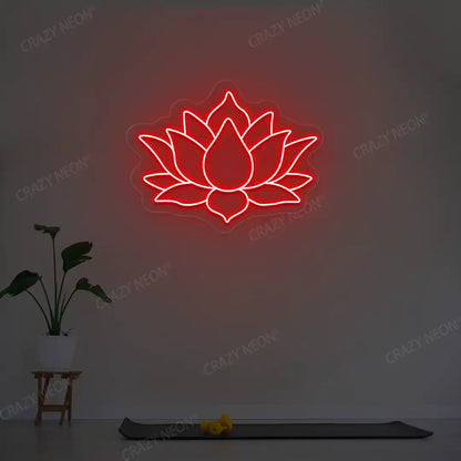 Lotus Flower Neon Sign lighting up in red color in a yoga room