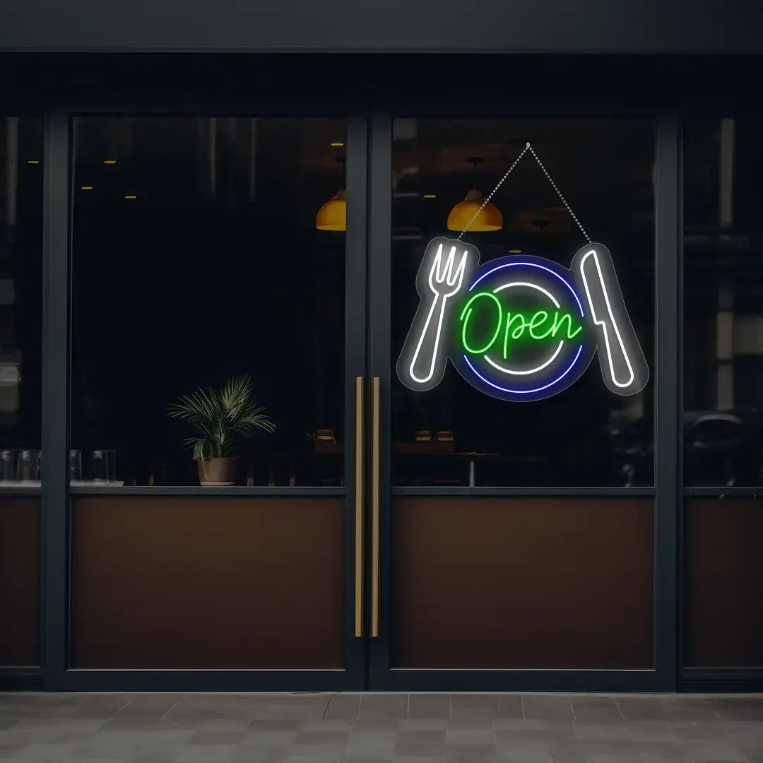 green diner open neon sign hanging on a window