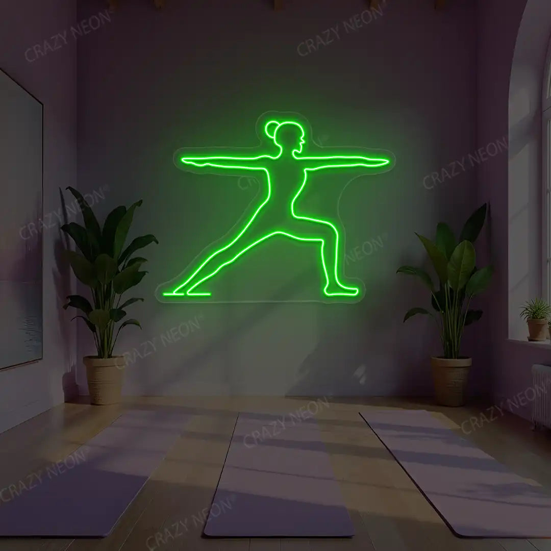 Virabhadrasana II Yoga Neon Sign lighting up in green color in a yoga room