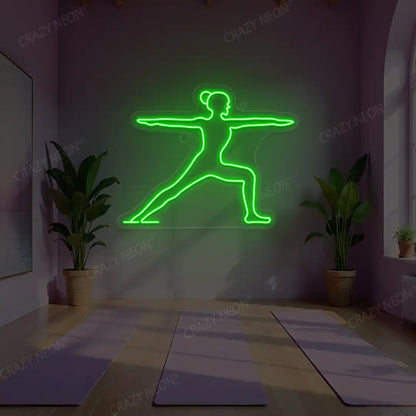 Virabhadrasana II Yoga Neon Sign lighting up in green color in a yoga room