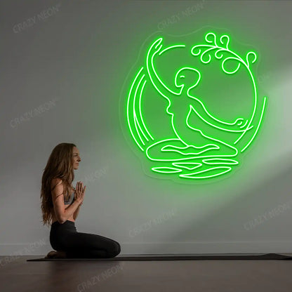 Chi Flow meditation Neon Sign lighting up in green color in a yoga room