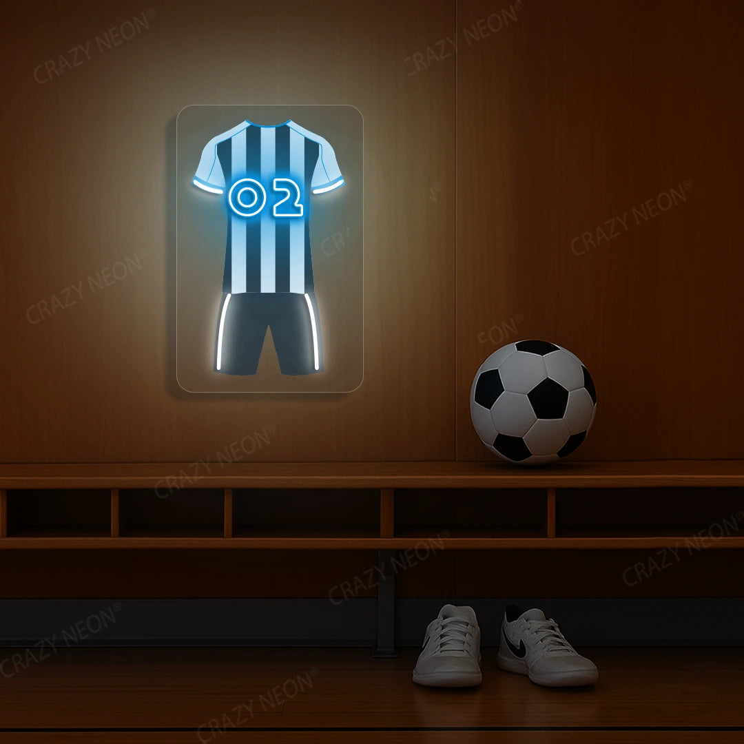 White and black striped football jersey neon artwork with number 02 glowing on a wooden wall