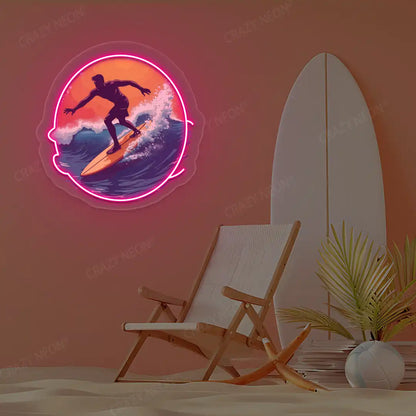 pink surfer catching wave neon artwork mounted on a wall