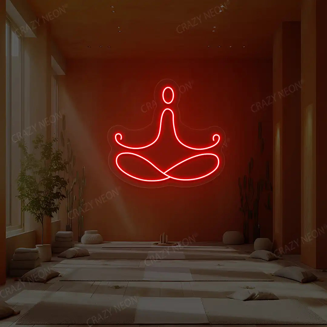 Padmasana Yoga Neon Sign lighting up in red color in a yoga room