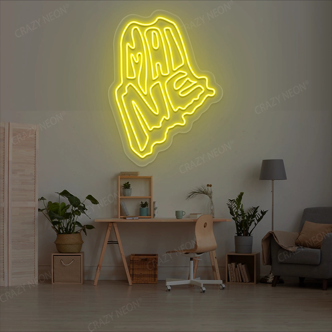 MAINE Map Neon Sign lighting up in yellow color in a room