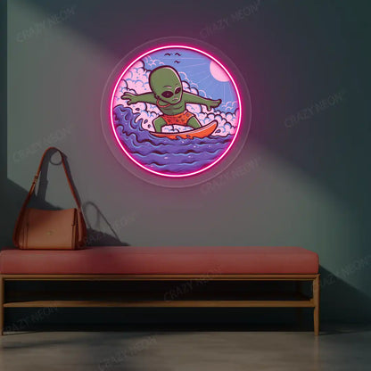 pink alien surfer neon artwork mounted on a wall
