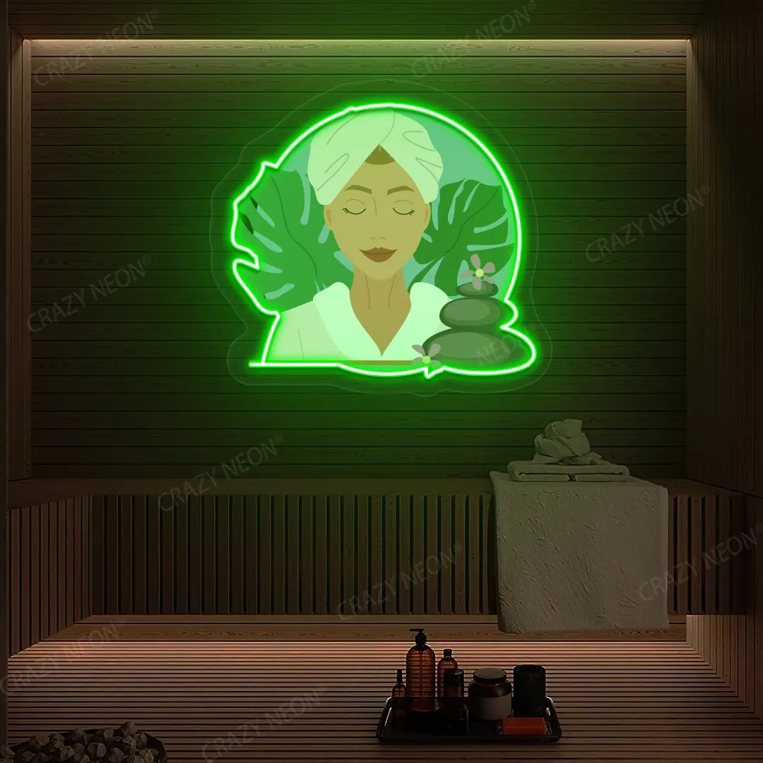 Zen Facial Spa Neon Artwork lighting up in green color on a wooden spa wall