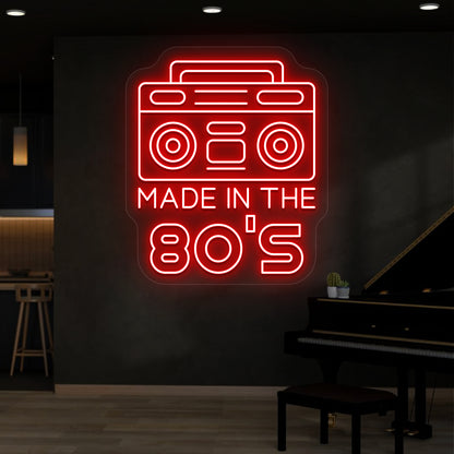 red made in the 80s stereo vintage neon sign mounted on a wall