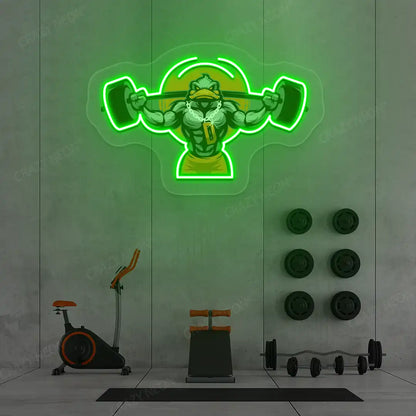 green muscular duck powerlifting gym neon artwork mounted on a wall