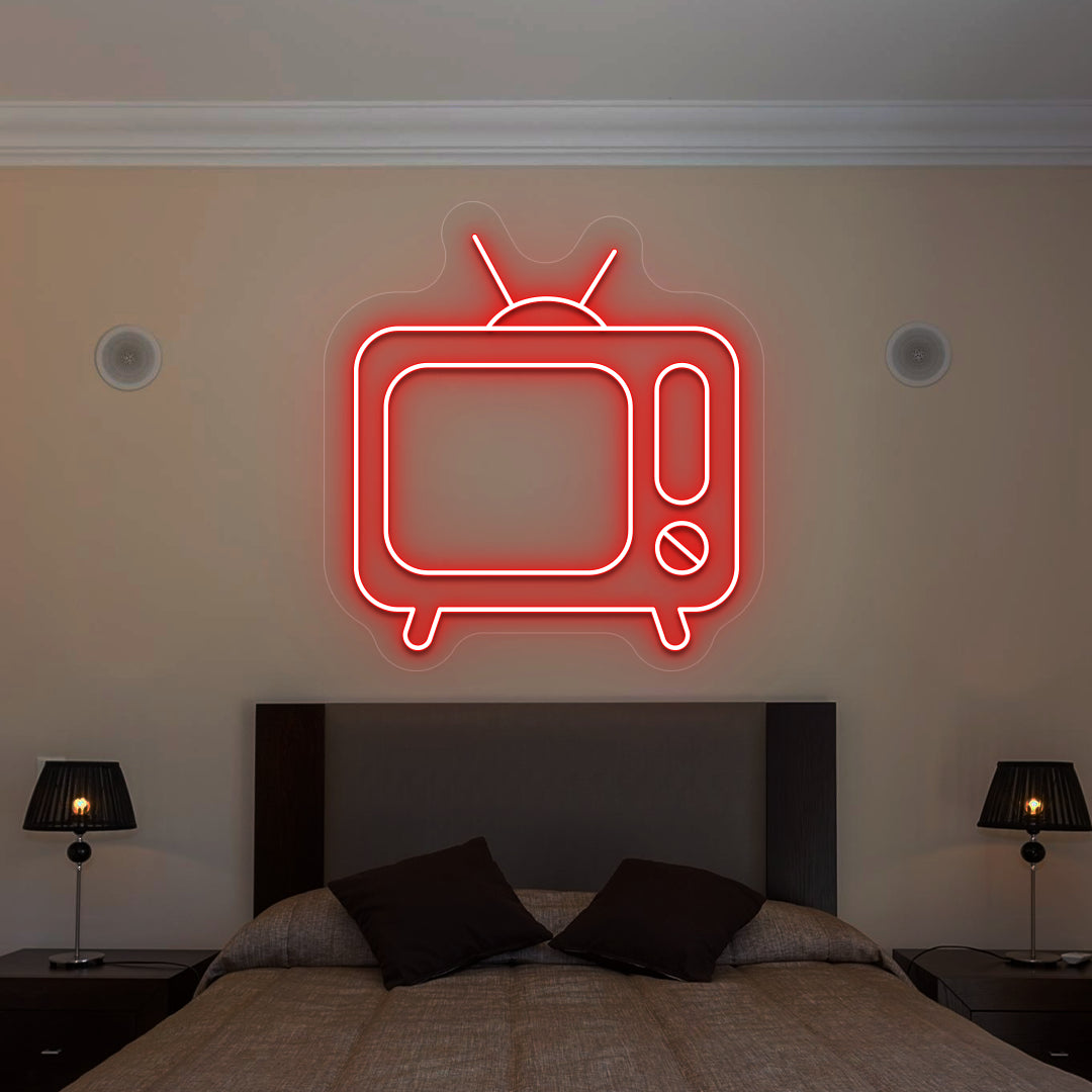red retro tv vintage neon sign mounted on a wall