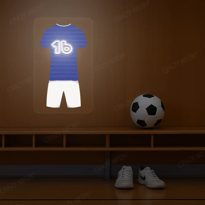 Blue football jersey neon artwork with number 16 glowing on a wooden wall