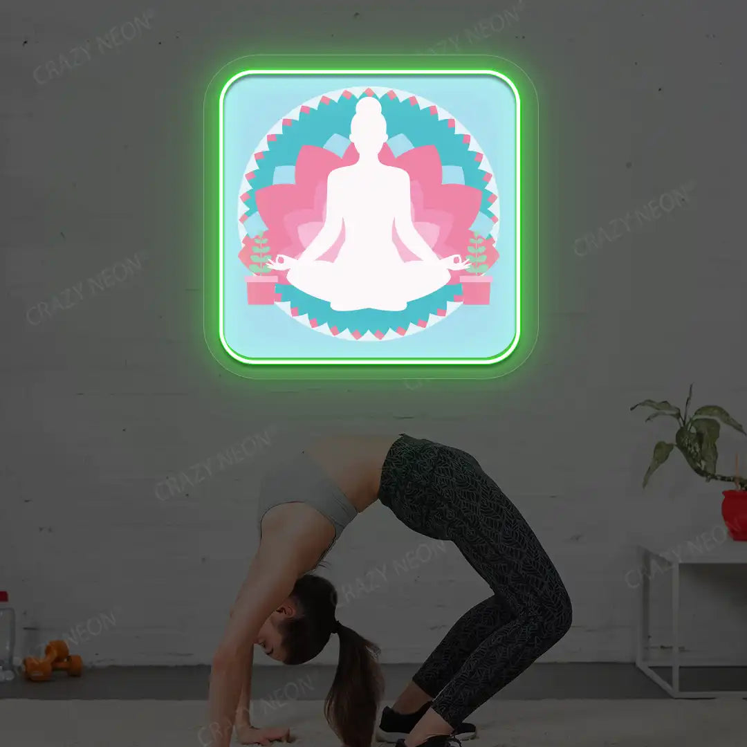 Padmasana Mandala Yoga Neon Artwork lighting up in green color in a yoga room