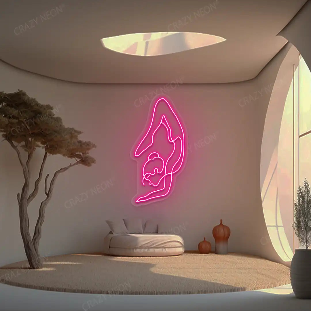 Purna Vrishchikasana Yoga Neon Sign glowing in pink color in a yoga room