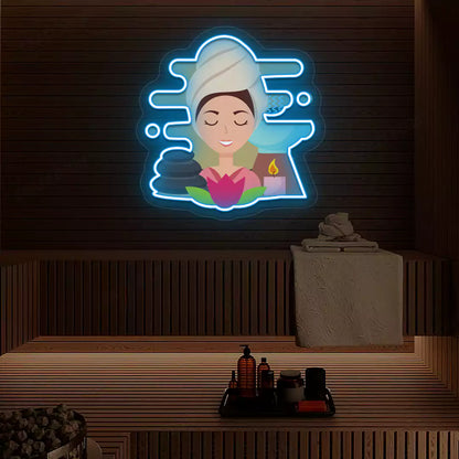 Steam Wellness Neon Artwork lighting up in ice blue color on a wooden spa wall