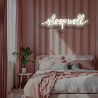 warm white sleepwell neon sign mounted on a wall