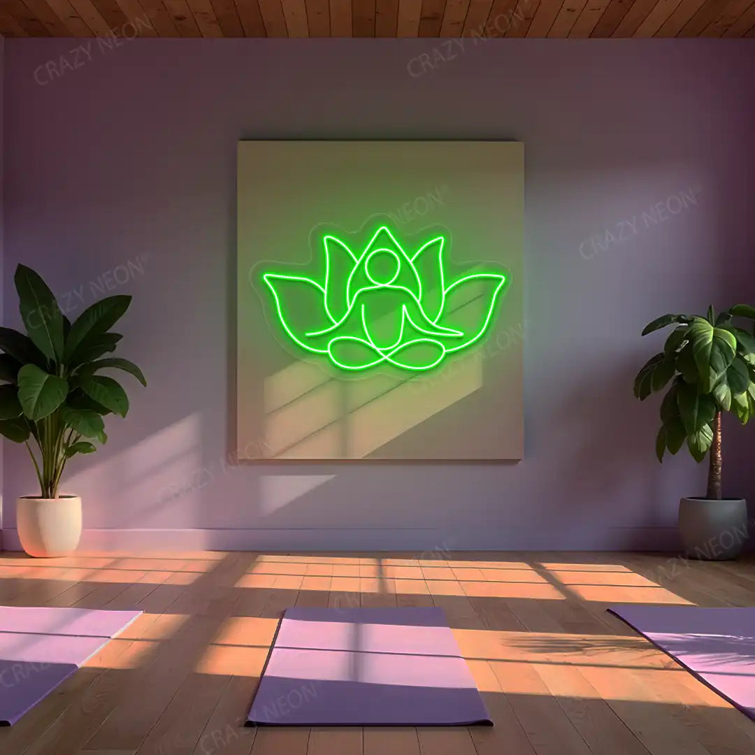 Lotus Meditation Neon Sign lighting up in green color in a yoga room
