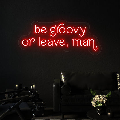 red be groovy or leave, man vintage neon sign mounted on a wall