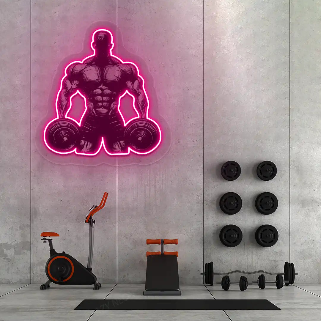 pink muscle man dumbbell gym neon artwork mounted on a wall