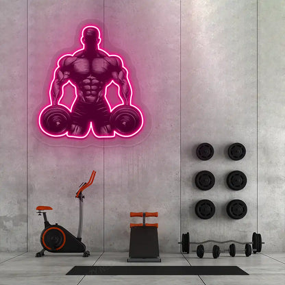 pink muscle man dumbbell gym neon artwork mounted on a wall