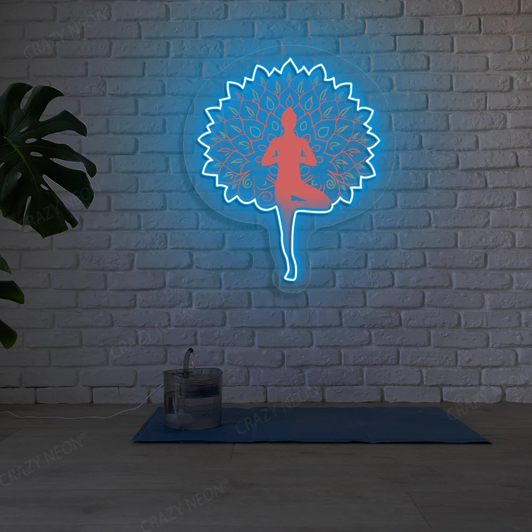 Mandala Yogi Harmony Tree Pose Yoga Neon Artwork lighting up in iceblue color in a yoga room