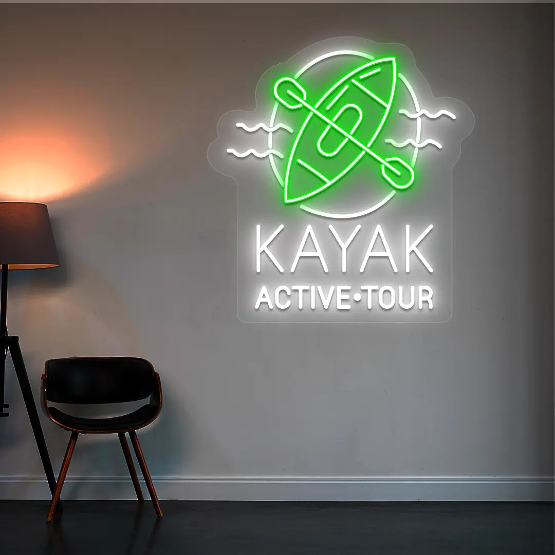 green and white kayak active tour neon sign mounted on a wall