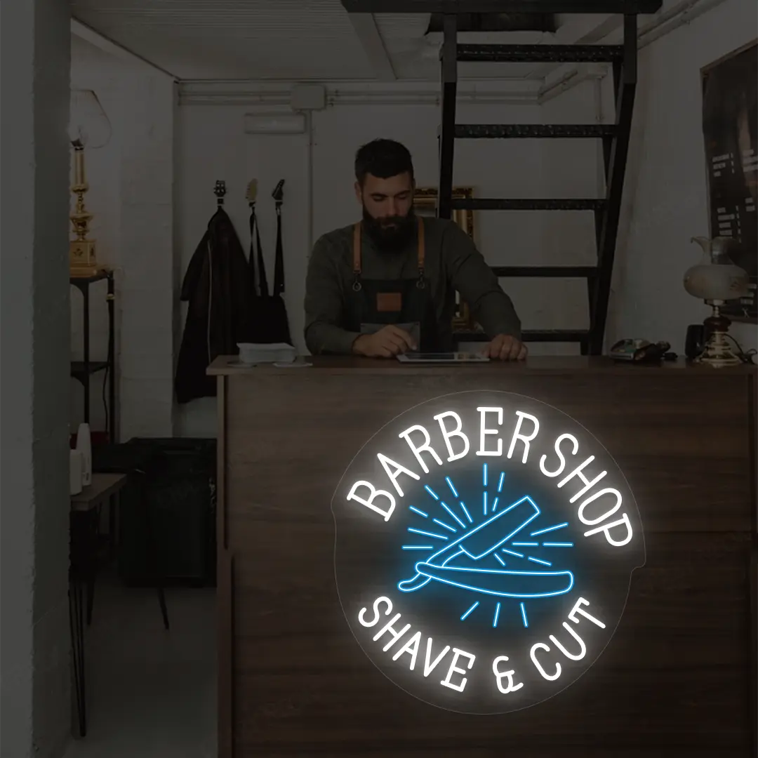 Barber Shop Shave & Cut Neon Sign in White and Ice Blue Colour mounted on wall