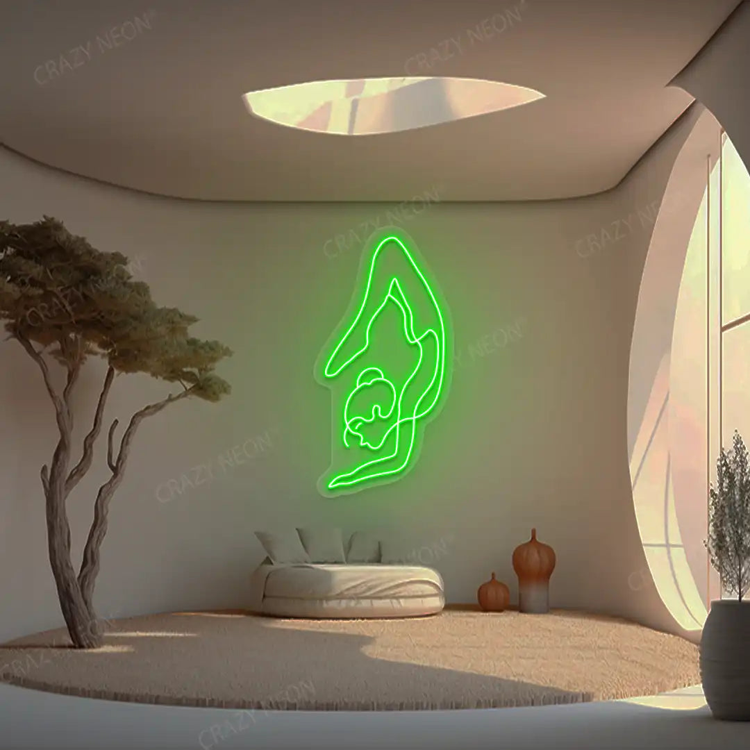 Purna Vrishchikasana Yoga Neon Sign glowing in green color in a yoga room