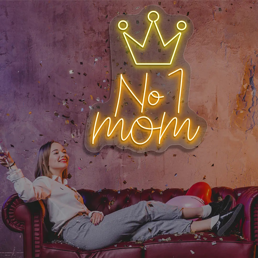 orange and yellow no 1 mom crown neon sign mounted on a wall
