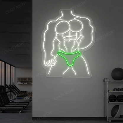 green and white physique pro neon sign mounted on a wall