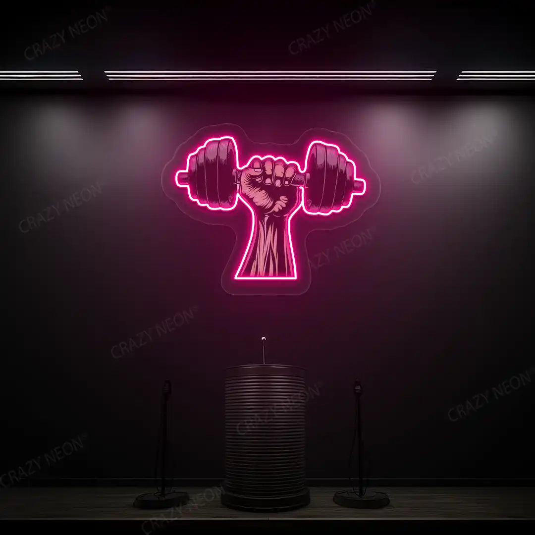 pink hand lifting dumbbell gym neon artwork mounted on a wall