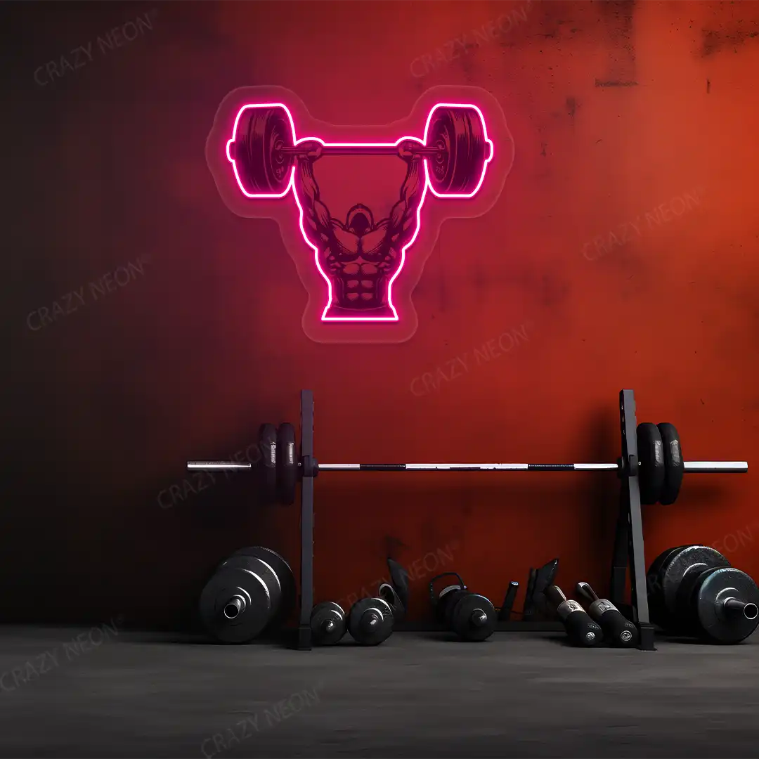 pink barbell overhead press gym neon artwork mounted on a wall 