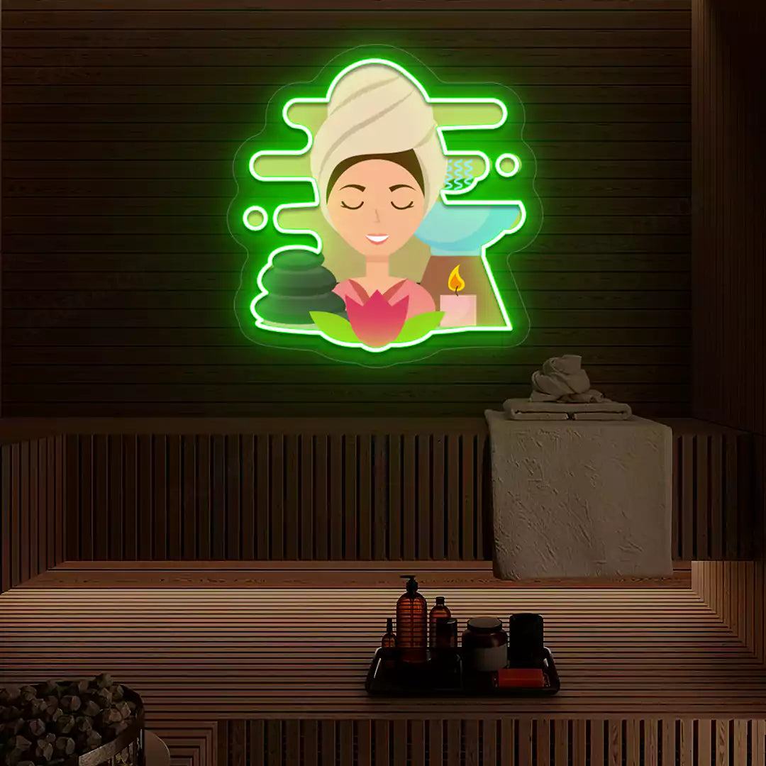 Steam Wellness Neon Artwork lighting up in green color on a wooden spa wall