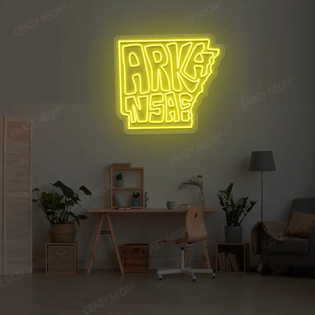 ARKANSAS Map Neon Sign lighting up in yellow color in a room