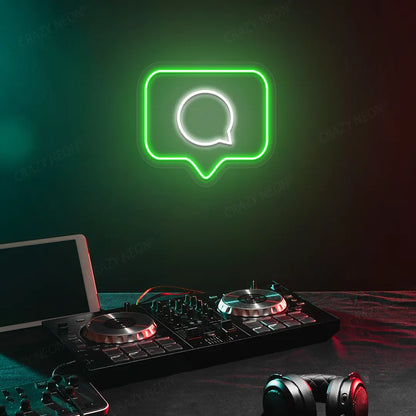 Comment Box Neon Sign in Green Color Mounted on a wall 