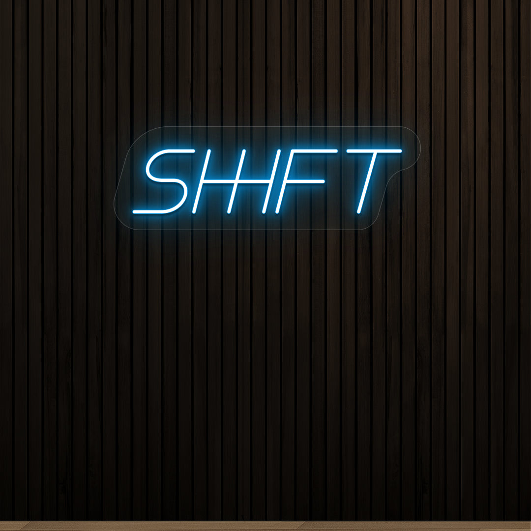 ice blue shift vintage neon sign mounted on a wall